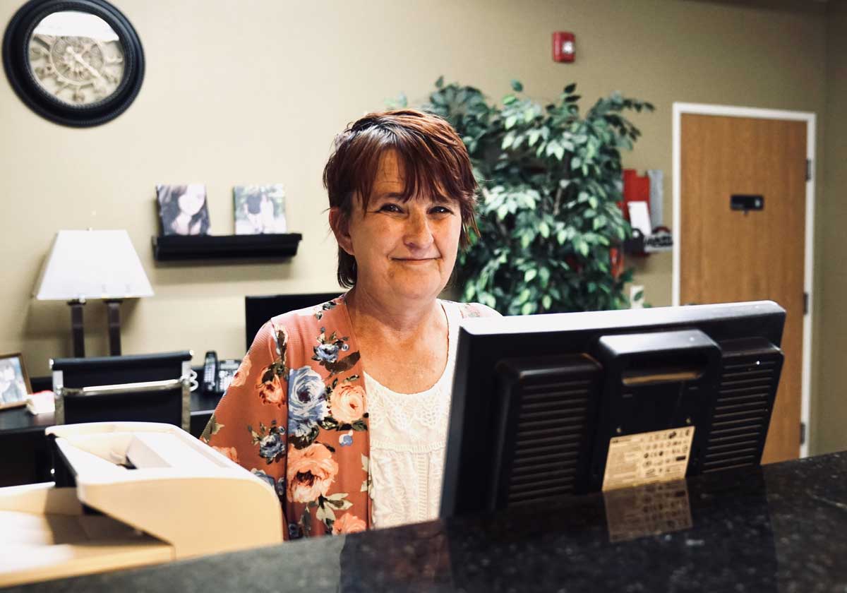 worker at the front desk